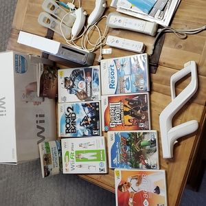 Original Nintendo Wii in original package, lots of extras